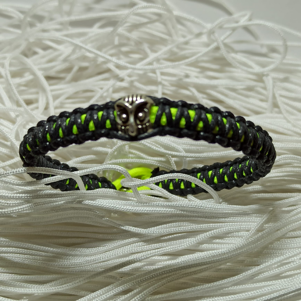 jewel paracord bracelet in waxed cotton and neon polyester cord with steel beadings